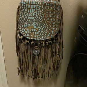 Hide and leather fringe purse